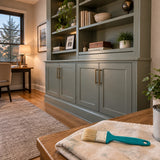 Finished painted built-in cabinet in a contemporary home study with the Total 1-inch oil paint brush set aside nearby