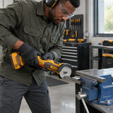 African American maintenance installer cutting a clamped steel flat bar with the Ingco CAGLI207625 cordless mini cut-off tool