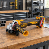 Ingco cordless angle grinder resting on an organized metal fabrication workbench