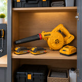 Ingco cordless air blower kit stored with two batteries and charger in an organised home workshop cabinet