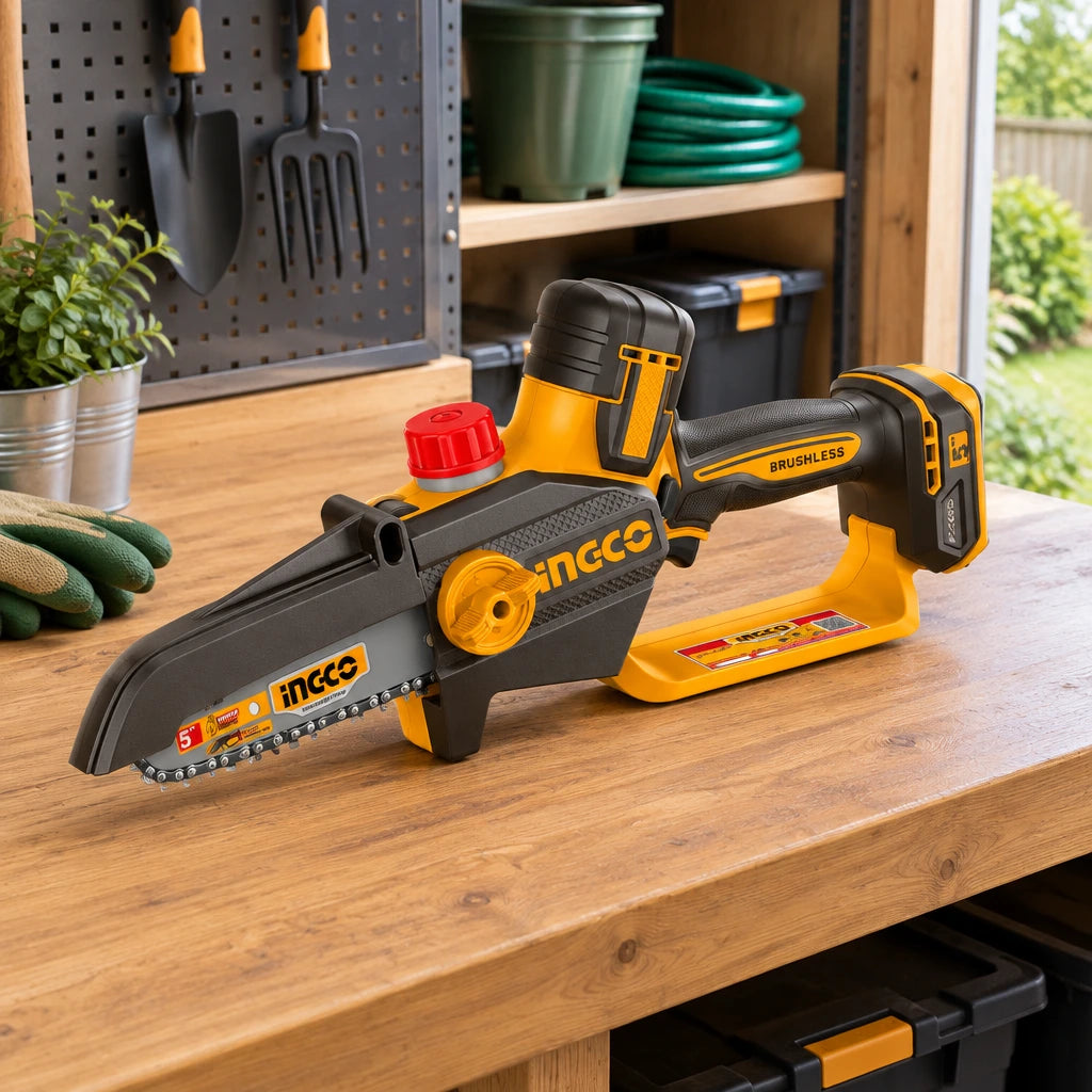 Ingco cordless pruning saw resting on a workbench in an organised contemporary garden utility room.