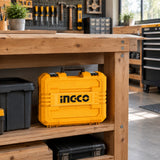 Ingco CIDLI16665 cordless impact drill kit stored in its yellow case on a clean joinery workshop shelf.