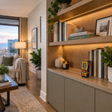 Completed fitted living room shelving with an Ingco HLDD10089 laser distance detector resting nearby