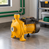 Ingco CPM37068 centrifugal water pump resting beside a prepared residential utility-room water service point