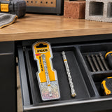 Ingco masonry drill bits stored in an organised accessory drawer on a clean contractor workshop bench