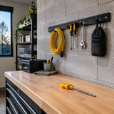 Completed wall-mounted utility rail with an Ingco SDS Plus masonry drill bit resting nearby