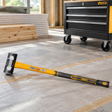Ingco 10 lb sledgehammer resting beside an organised renovation site tool chest