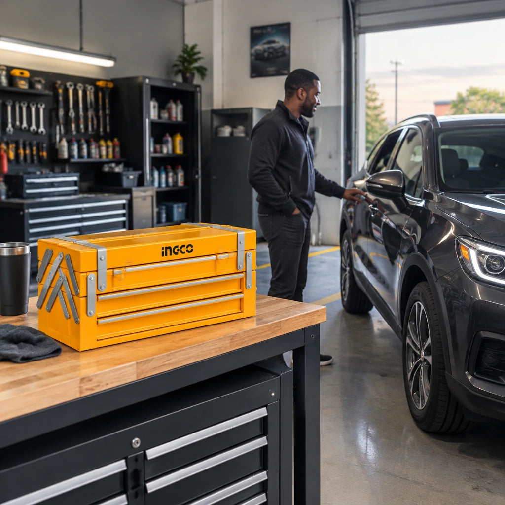 Serviced vehicle ready in an orderly workshop with the closed Ingco HTCS261168 tool chest on a nearby bench