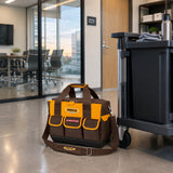 Ingco HTBG12 tool bag parked beside a cleared service cart in a tidy commercial service area