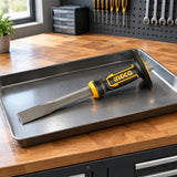 Ingco flat cold chisel resting in an organised contemporary maintenance workshop