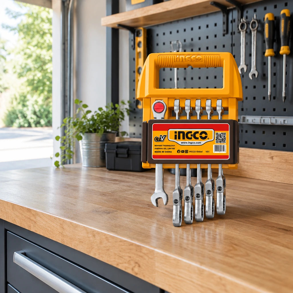 Ingco flexible ratchet spanner set resting in its orange holder on an organised contemporary home garage workbench.
