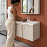 African American adult rinsing a grooming item at the integrated basin of a T-9523 bathroom vanity