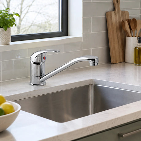 Vado Matrix Mono chrome swivel kitchen mixer installed beside a contemporary residential sink