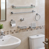 Nate BR chrome bathroom accessory set installed on a tiled bathroom wall with glass shelf and coordinated holders