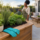 Finished terrace herb garden with turquoise Total PVC gloves resting beside the newly planted raised bed