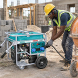 Ghanaian construction worker connecting a Total TP1150006 gasoline generator to a site power lead during building work