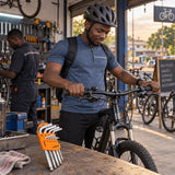 Ready bicycle beside a Coofix nine-piece hex key set after a workshop handlebar adjustment
