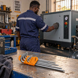 Completed workshop machine beside a Coofix nine-piece Torx key set after maintenance