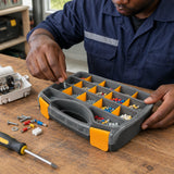Ghanaian technician sorting screws and electrical terminals into a Coofix 15-compartment plastic organizer