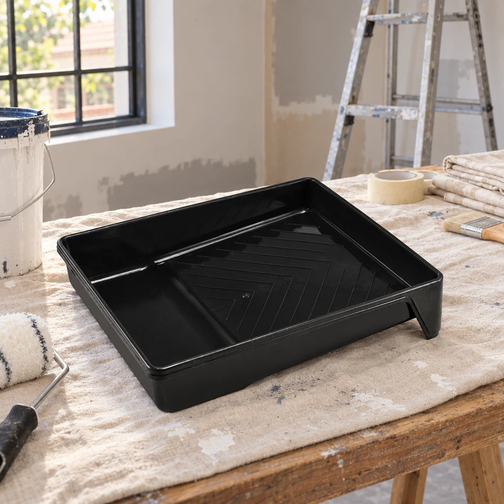 Empty Coofix plastic paint tray resting on a workbench in a home renovation room