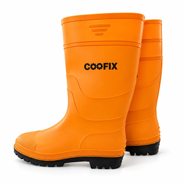 Pair of orange Coofix PVC rain wellington boots with black lugged soles on a clean white background