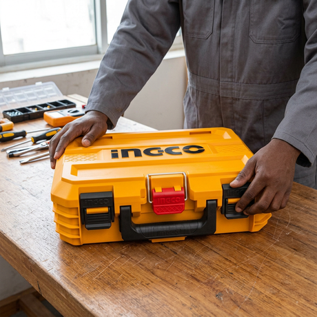 Technician checking the latches on the Ingco 16-inch toolbox