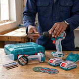 Technician fitting a drill bit with the battery removed