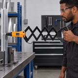 Technician using the Coofix folding riveter on metal sheets