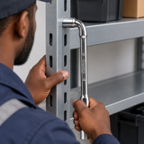 Technician using the Coofix socket wrench seated against a shelf fastener