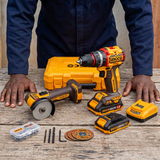 Technician with the Ingco mini cut-off tool and impact drill kit