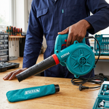 Technician with the Total TB4066 electric blower and dust bag