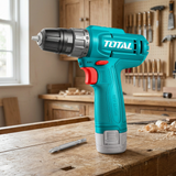 Total TDLI12456 cordless drill on a woodworking bench