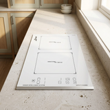 White Kaiser Grand Chef Domino induction hob in a bright kitchen